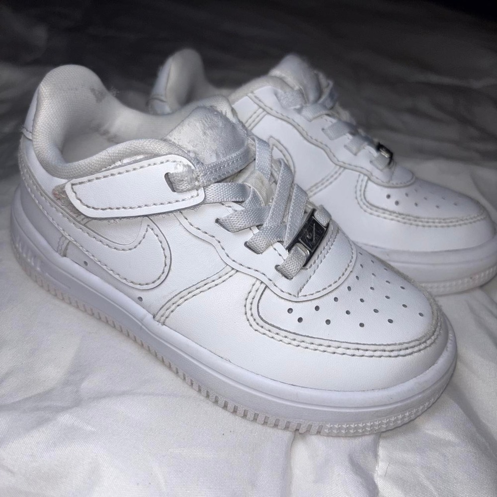 White Nike Air Force One low top toddler kids sneakers